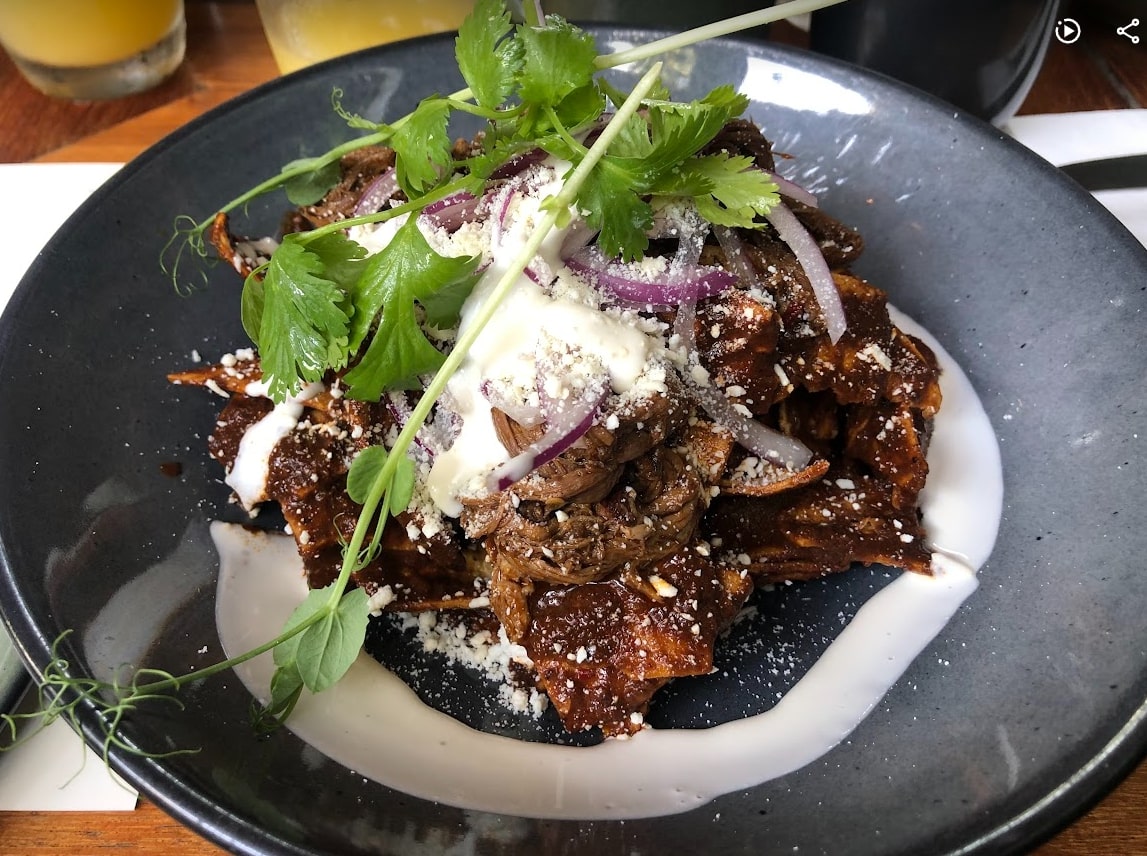 Mole chilaquiles with barbacoa offered at Tz´onot Restaurant. 